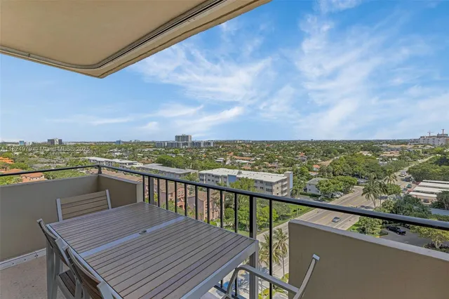 a view of a city skyline from a balcony