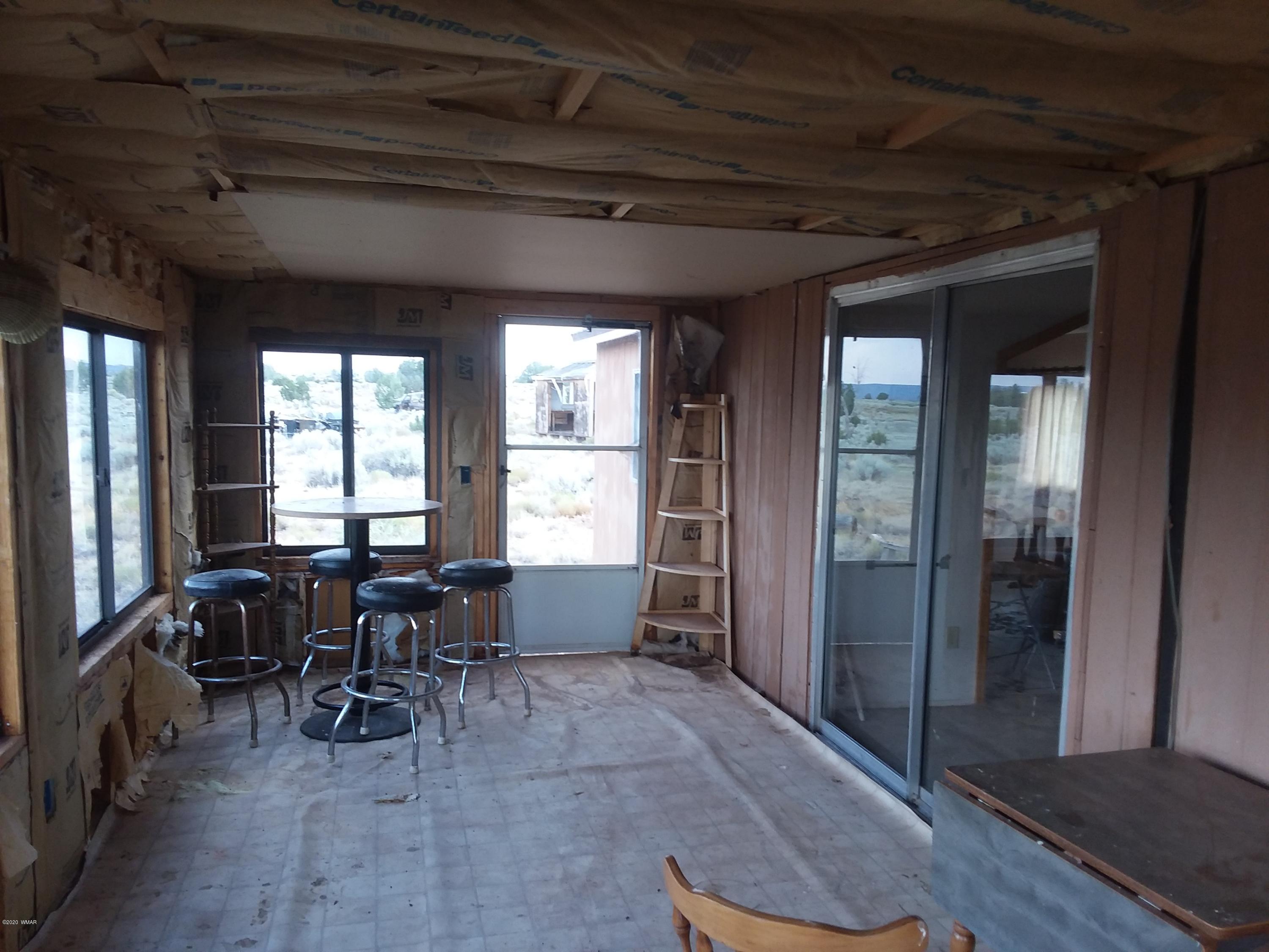 Lot 361 Woodridge Ranch, Unit 9 Concho, AZ 85924 - Photo 18 of 22 a view of a livingroom with furniture and window