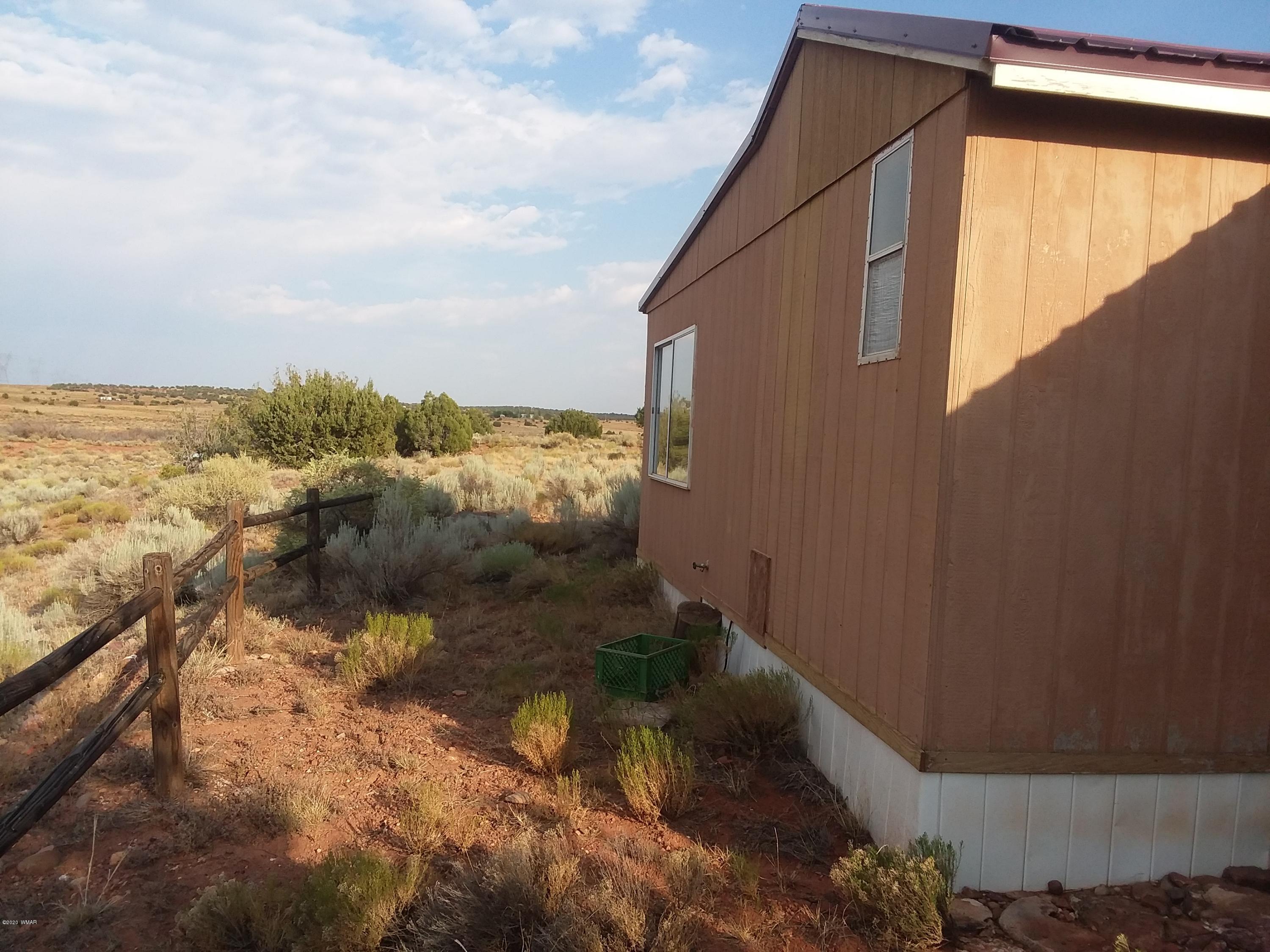 Lot 361 Woodridge Ranch, Unit 9 Concho, AZ 85924 - Photo 20 of 22 a view of a lake from a balcony