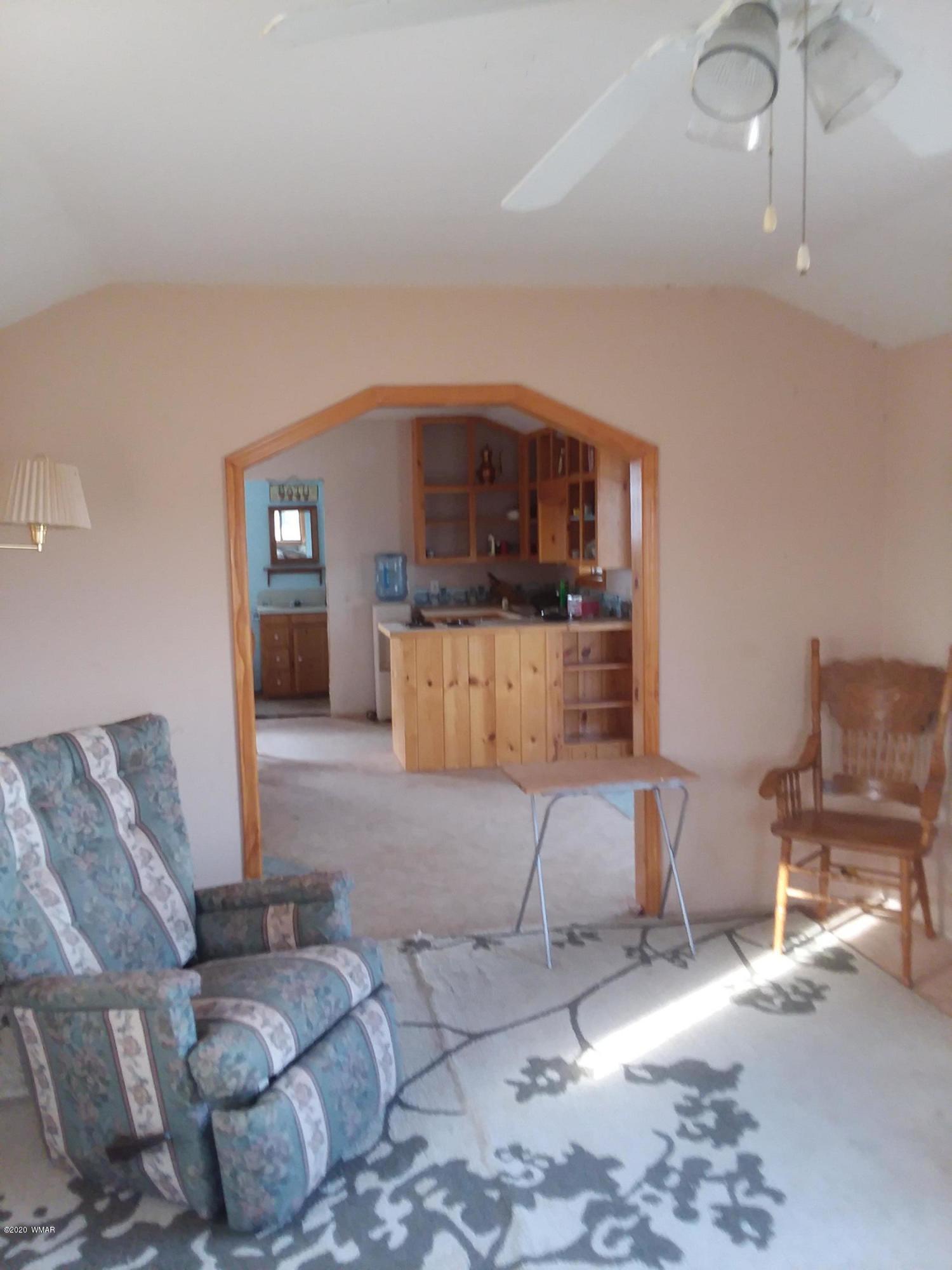 Lot 361 Woodridge Ranch, Unit 9 Concho, AZ 85924 - Photo 4 of 22 a living room with furniture and a couch
