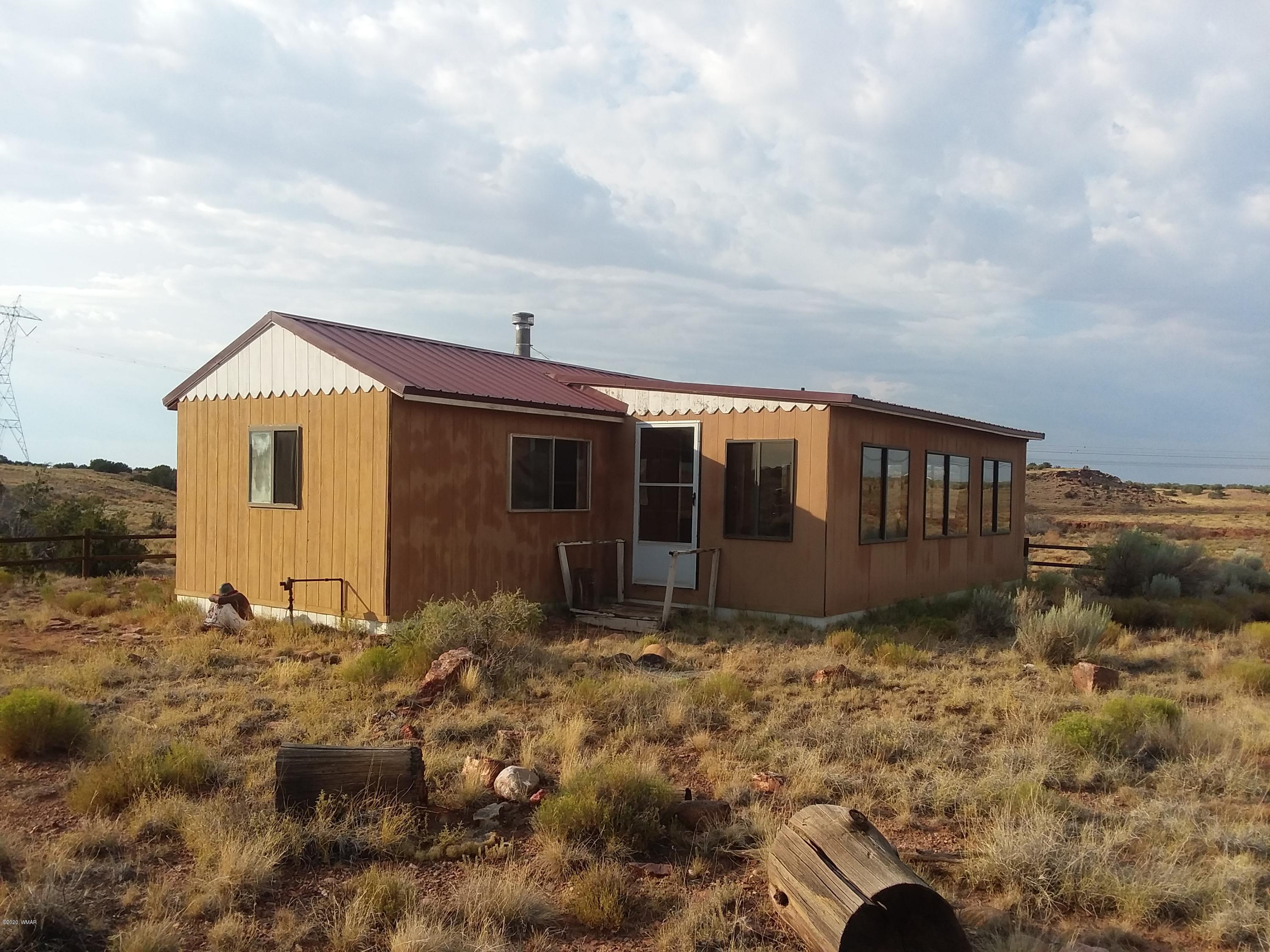 Lot 361 Woodridge Ranch, Unit 9 Concho, AZ 85924 - Photo 10 of 22 a house view with a garden space