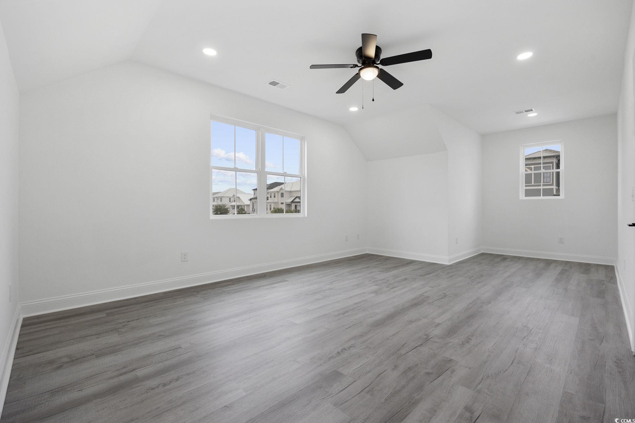 514 Harbour View Drive Myrtle Beach, SC 29579 - Photo 24 of 40 Additional living space with light wood-style flooring, lofted ceiling, recessed lighting, and a ceiling fan