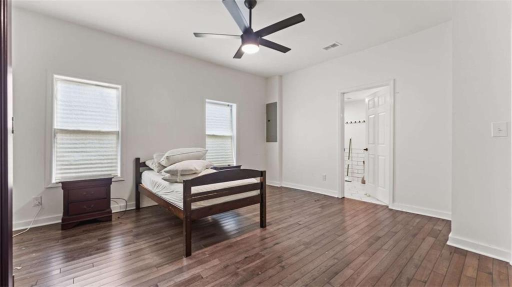 5491 Hill Road Southwest Powder Springs, GA 30127 - Photo 15 of 22 a view of bedroom with furniture and wooden floor