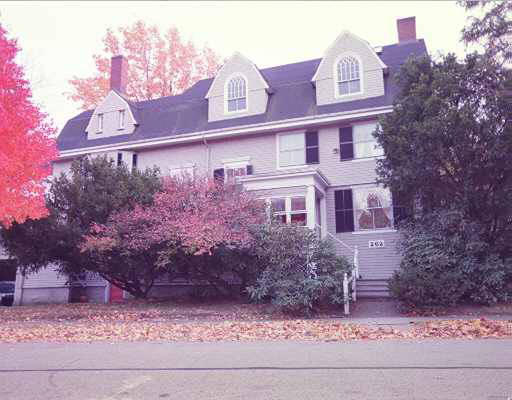 262 Clinton Road Brookline, MA 02445 - Photo 1 of 1 a front view of a house with a yard