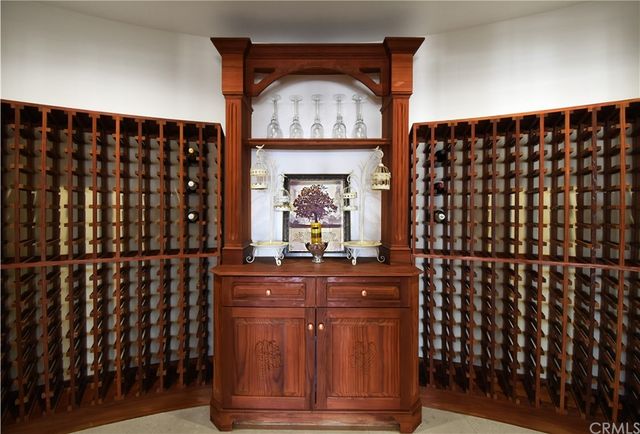 a front view of a house with yard and garage