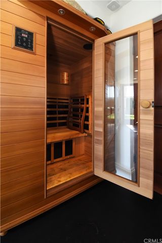 a view of roof deck with couches