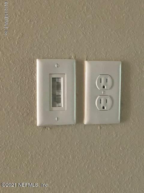 2565 Sandy Dune Drive Jacksonville, FL 32233 - Photo 14 of 14 a view of a hallway