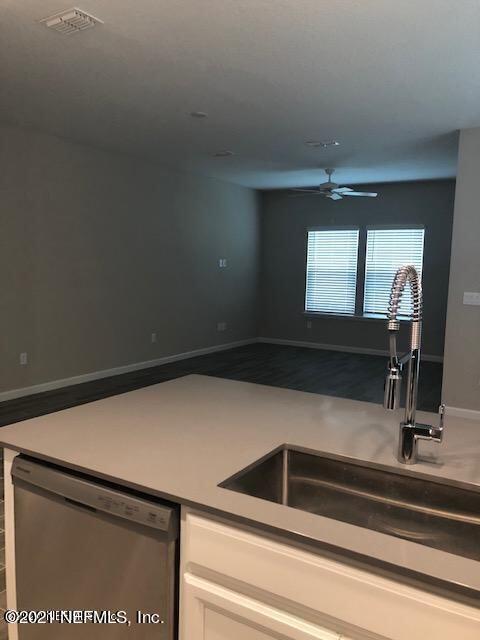 2565 Sandy Dune Drive Jacksonville, FL 32233 - Photo 6 of 14 a close view of sink and tap