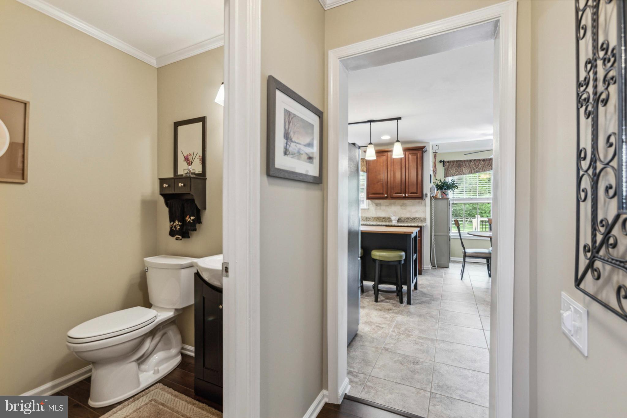 24 Oakview Drive Newark, DE 19702 - Photo 15 of 39 a bathroom with a toilet and a sink