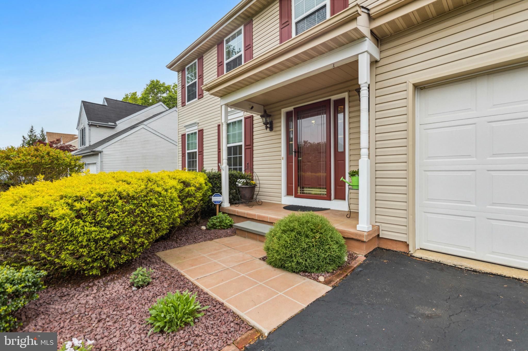 24 Oakview Drive Newark, DE 19702 - Photo 2 of 39 a view of a house with a small yard and pathway
