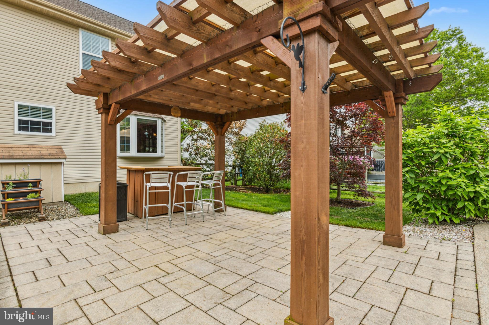 24 Oakview Drive Newark, DE 19702 - Photo 27 of 39 a view of a porch with chairs and backyard of the house