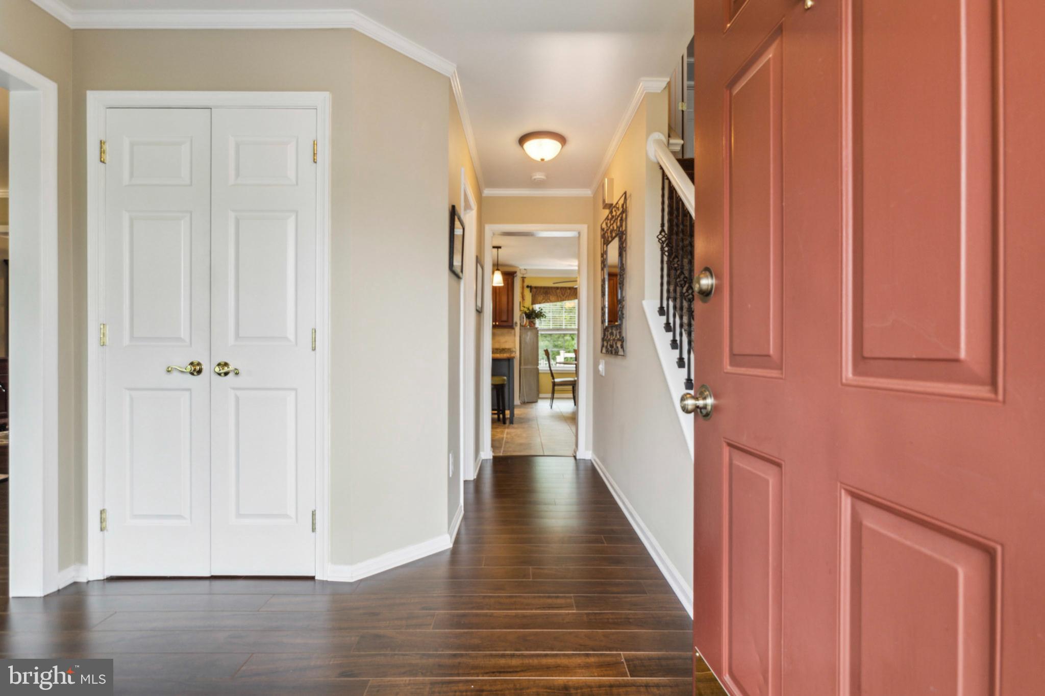 24 Oakview Drive Newark, DE 19702 - Photo 4 of 39 a view of a hallway with wooden floor