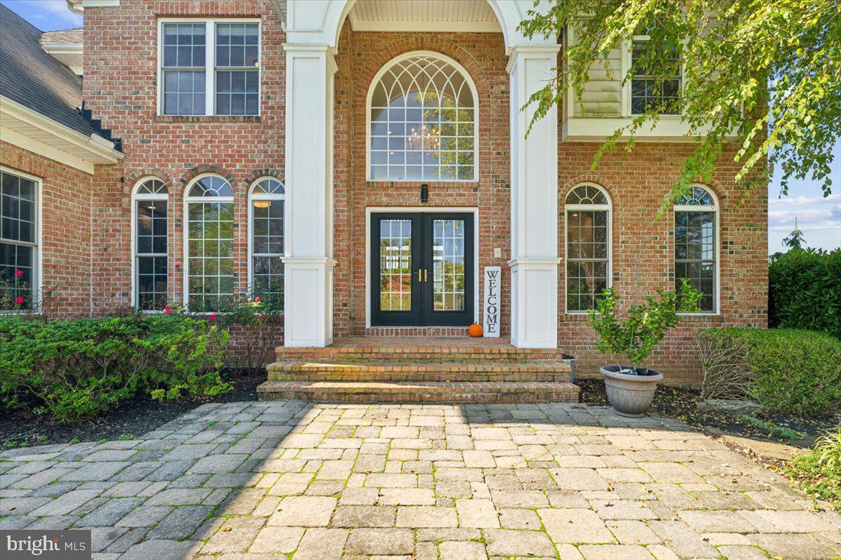 5340 Old Middletown Road Jefferson, MD 21755 - Photo 3 of 55 a view of a brick house with plants