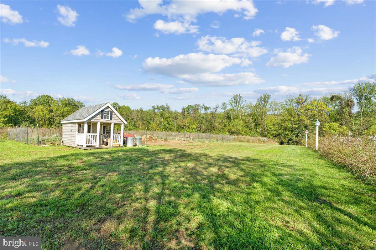 5340 Old Middletown Road Jefferson, MD 21755 - Photo 50 of 55 a view of a big house with a big yard and large trees