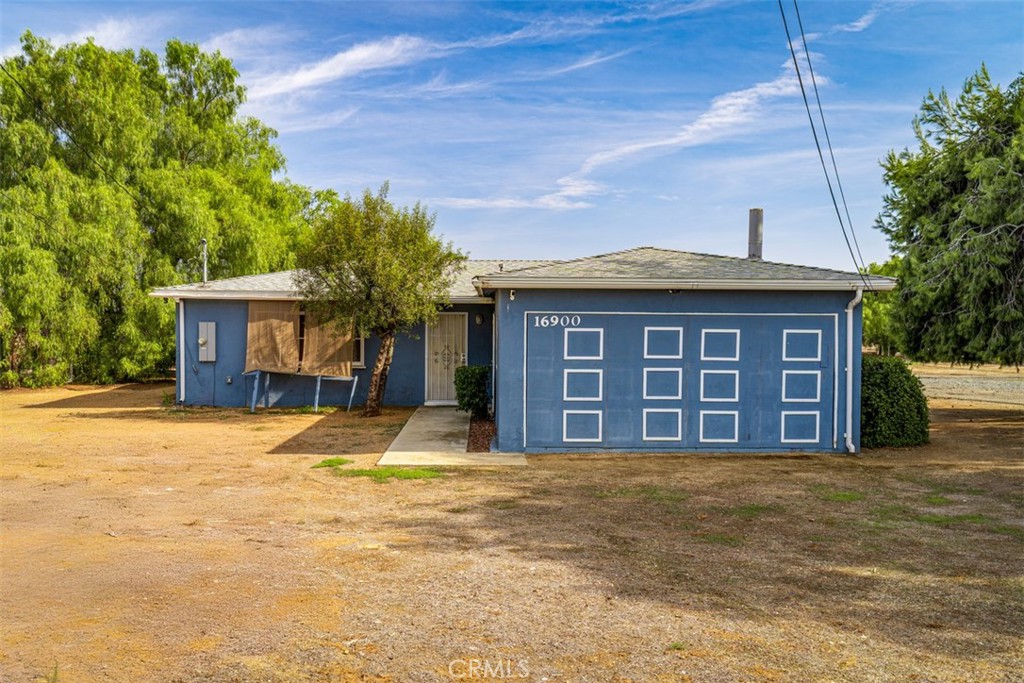 16900 Wood Road Riverside, CA 92508 - Photo 1 of 1 a view of a house with a yard