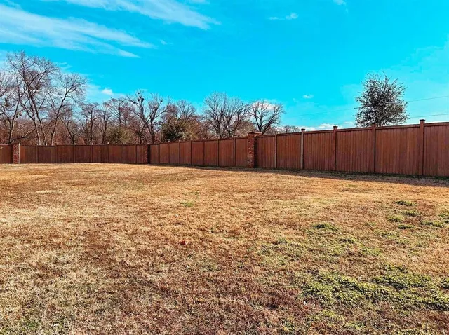 a view of an outdoor space and a yard