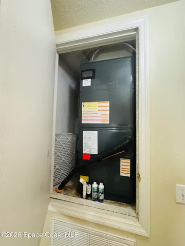 a bathroom with a mirror and a sink