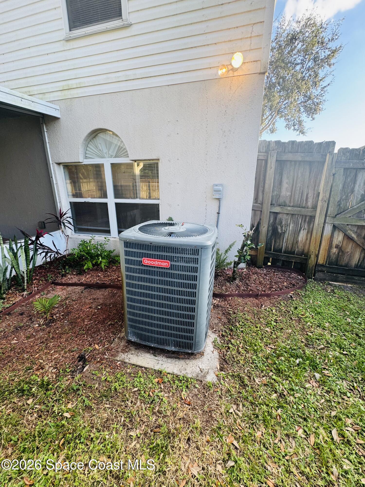 4550 Elena Way Melbourne, FL 32934 - Photo 31 of 33 a front view of a house with a garden