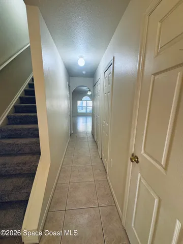 a view of hallway with stairs