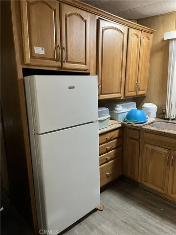 a kitchen with a stove and a microwave