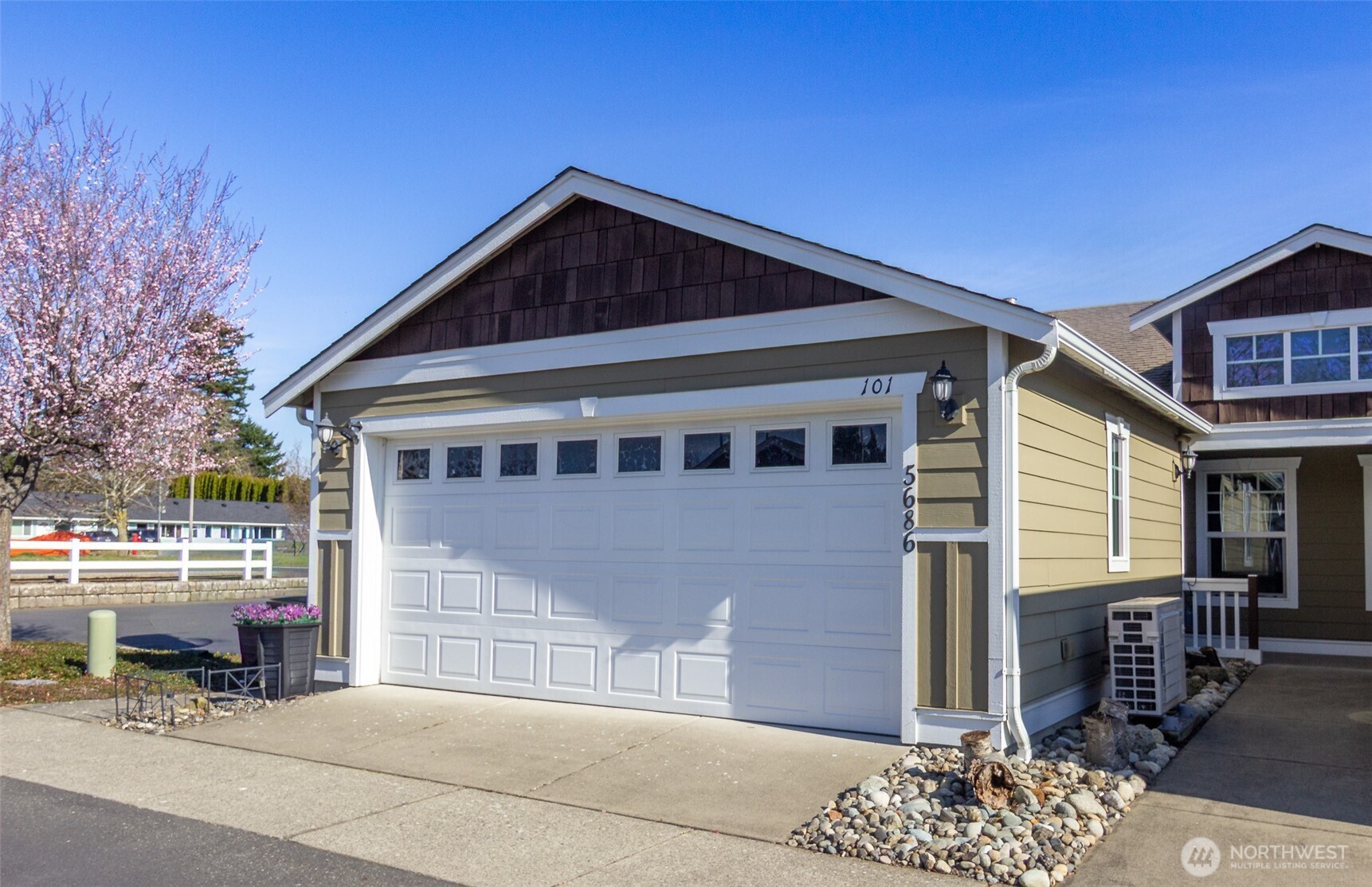 a front view of a house with a outdoor space