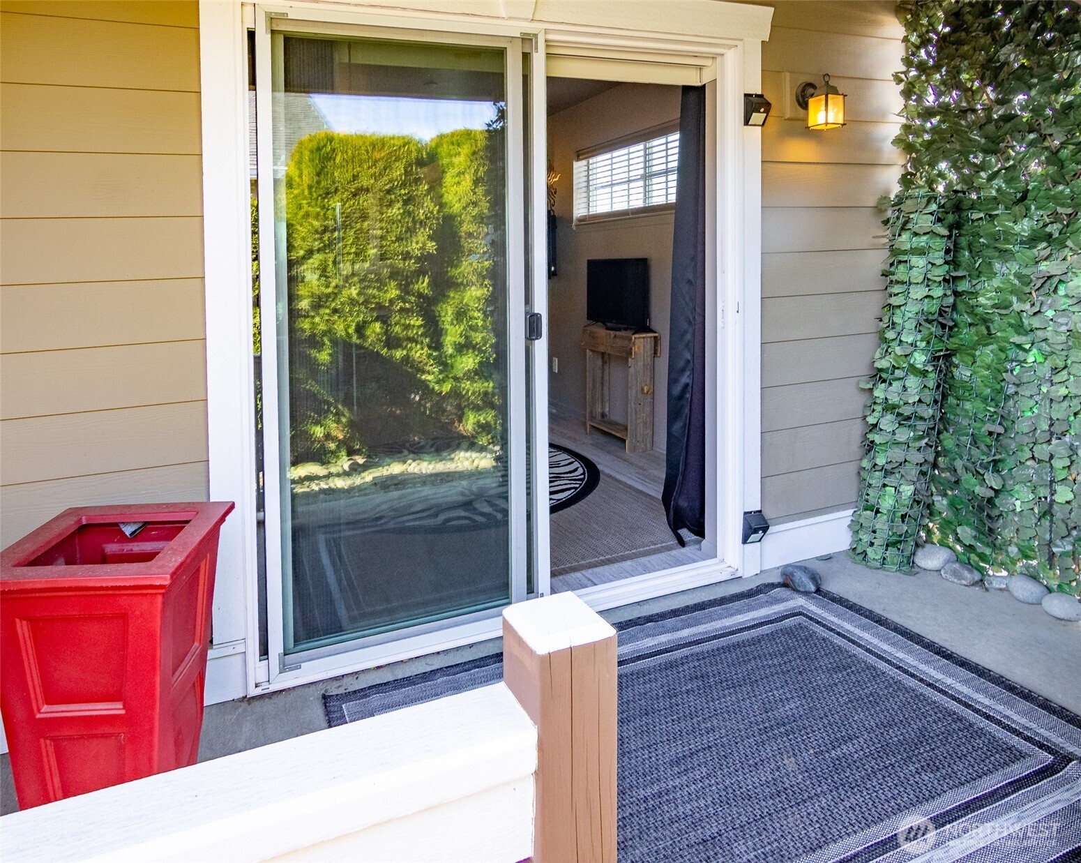 5686 Correll Drive, Unit 101 Ferndale, WA 98248 - Photo 13 of 22 a view of a door of the house with a yard