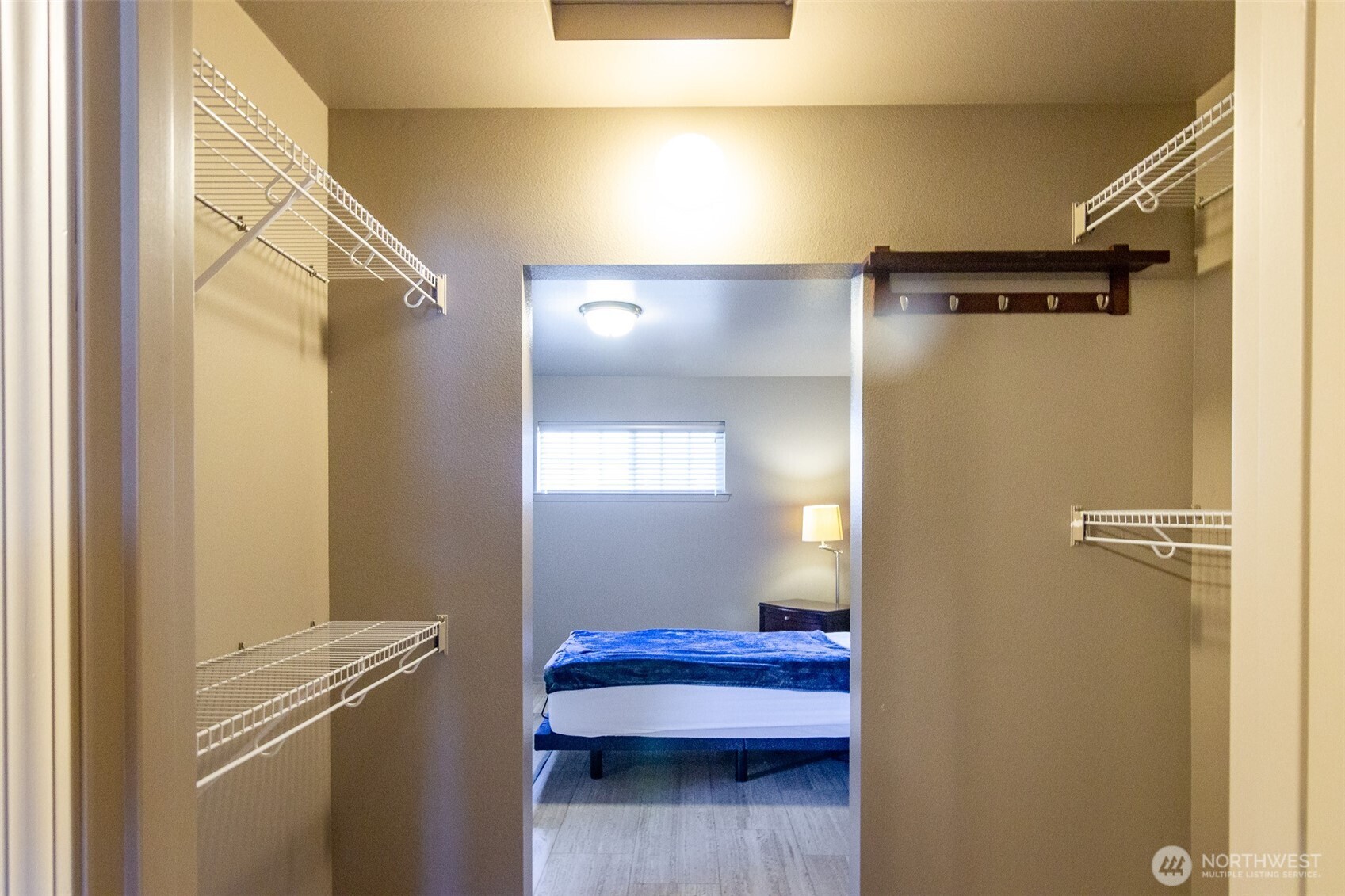 5686 Correll Drive, Unit 101 Ferndale, WA 98248 - Photo 15 of 22 a view of a hallway with closet and wooden floor
