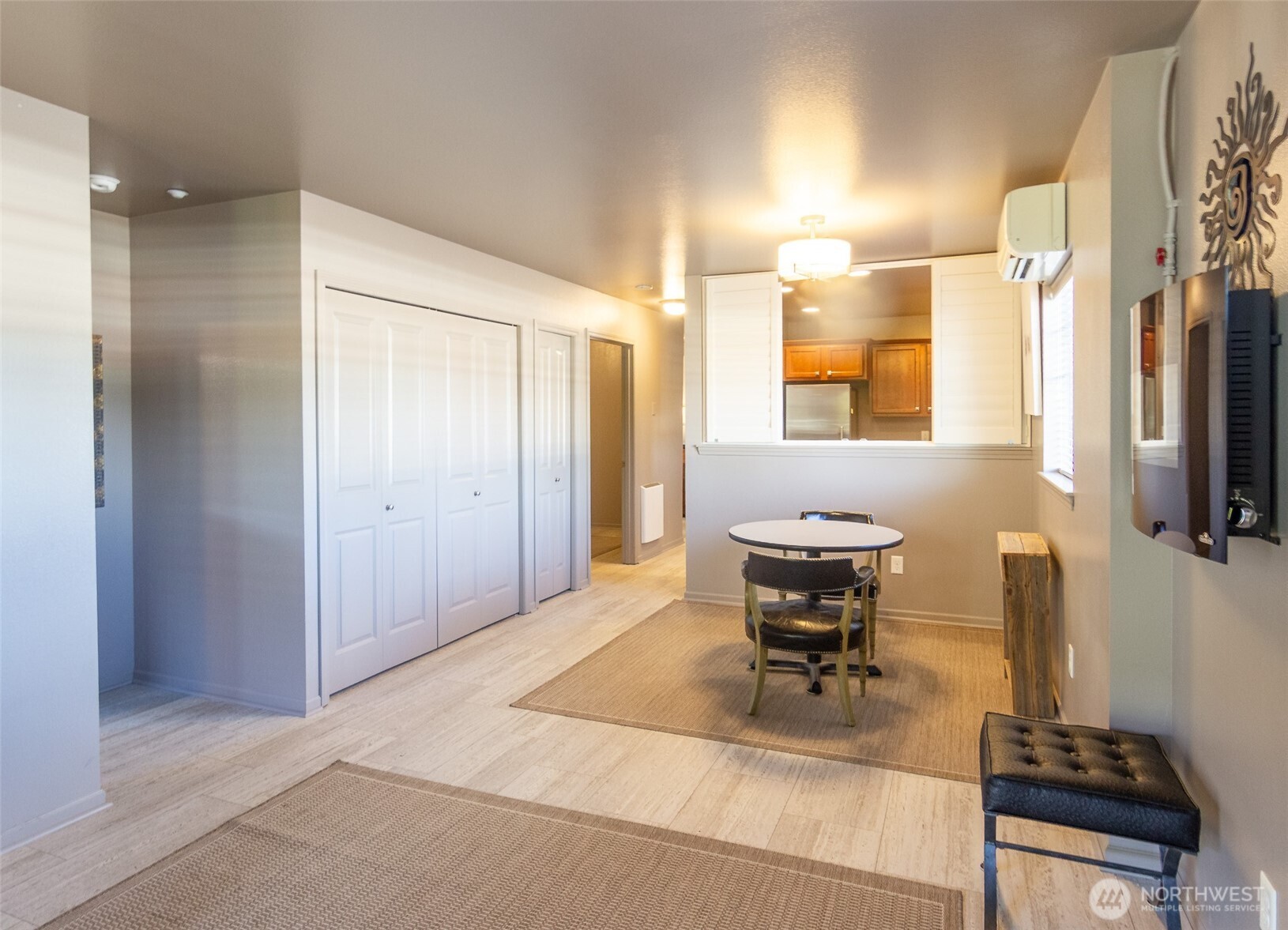 5686 Correll Drive, Unit 101 Ferndale, WA 98248 - Photo 10 of 22 a dining room with furniture and a chandelier
