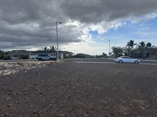 a view of a road with fire pit