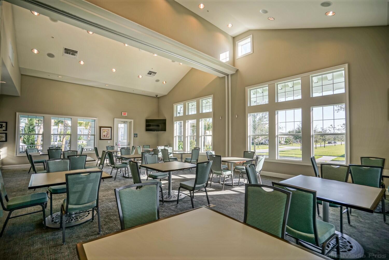 1132 South Community Drive Jupiter, FL 33458 - Photo 19 of 20 a view of a dining room with furniture window and outside view