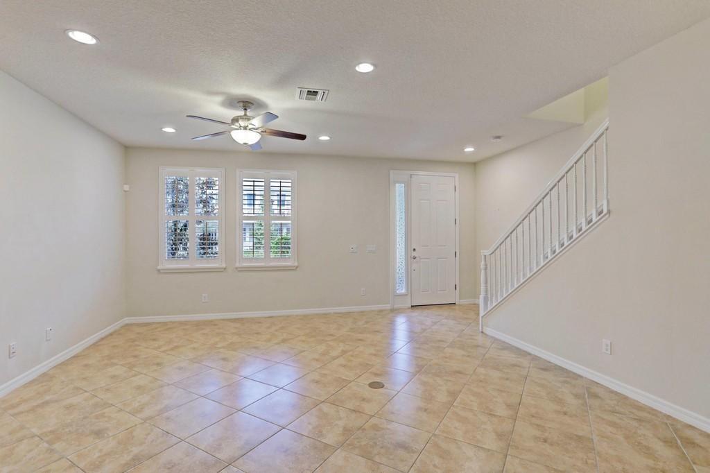 1132 South Community Drive Jupiter, FL 33458 - Photo 3 of 20 a view of an empty room with a window