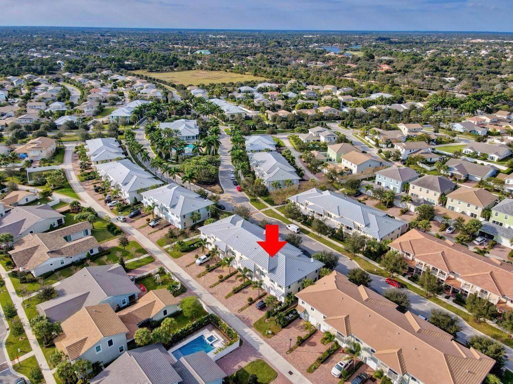 1132 South Community Drive Jupiter, FL 33458 - Photo 9 of 20 an aerial view of a city with lots of residential buildings