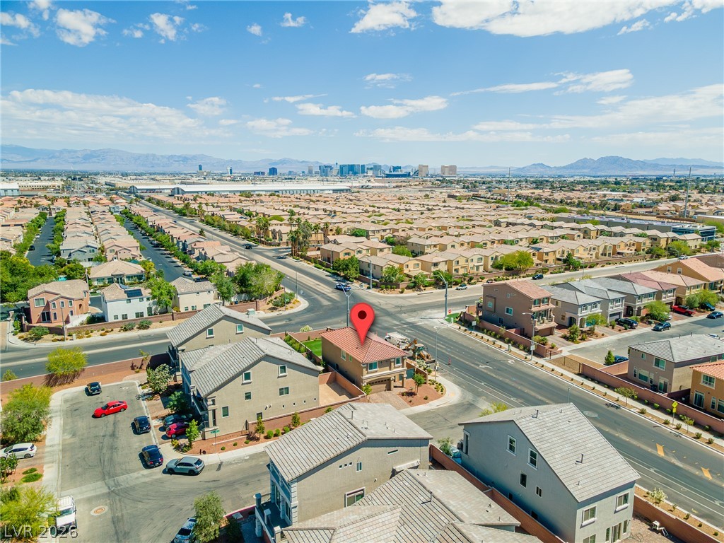 5510 Ripple Ridge Avenue Las Vegas, NV 89139 - Photo 14 of 45 An inviting neighborhood unfolds beneath a vast sky, offering a captivating aerial perspective.