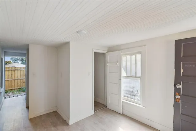 an empty room with windows