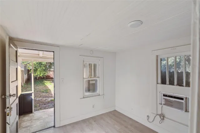 a view of a room that has a large window