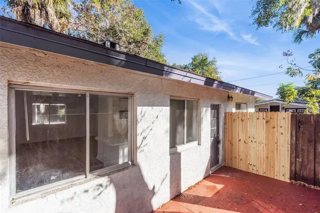 a view of a house with a glass door