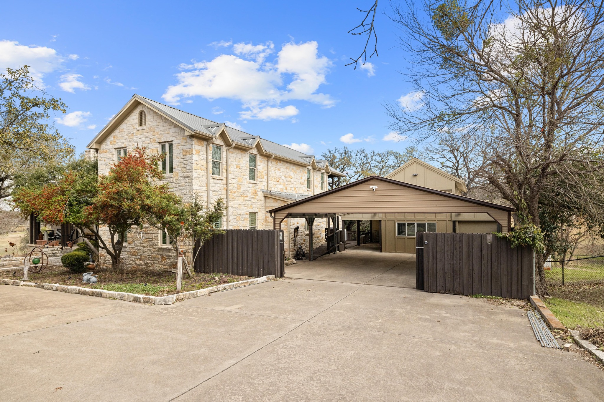 913 South Ridge Road Salado, TX 76571 - Photo 34 of 40 Large covered parking area is gated and leads to workshop