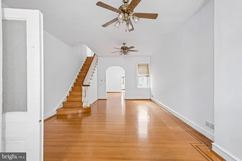 a view of entryway with wooden floor