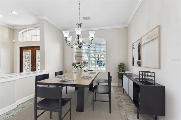 a kitchen with stainless steel appliances a stove top oven and cabinets