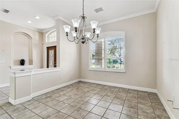 a kitchen with stainless steel appliances granite countertop a sink and a stove