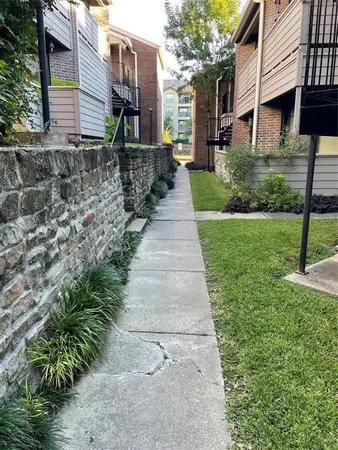 a view of balcony with wooden floor
