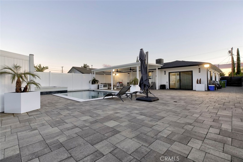 10263 Strathern Street Sun Valley, CA 91352 - Photo 16 of 19 a view of a house with backyard and sitting area