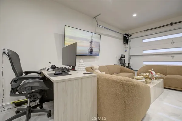 a view of a workspace with furniture