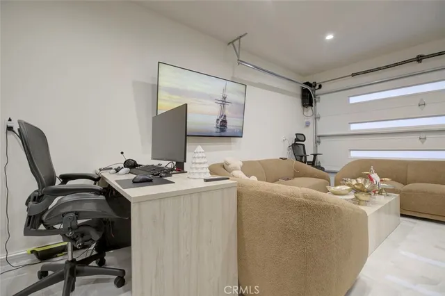 a view of a workspace with furniture