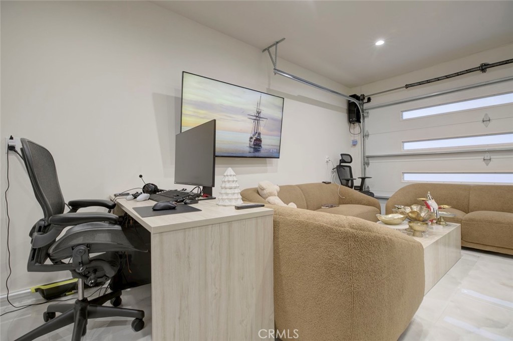 10263 Strathern Street Sun Valley, CA 91352 - Photo 17 of 19 a view of a workspace with furniture