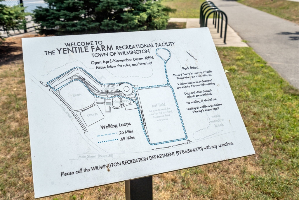 7 Cross Street, Unit 306 Wilmington, MA 01887 - Photo 12 of 17 a view of a sign on a wall