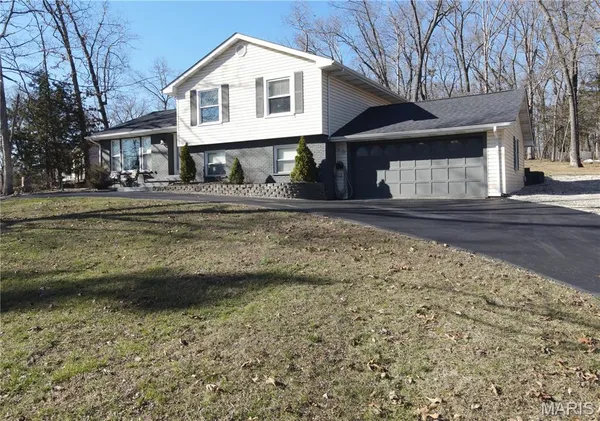 $399,500 | 5697 Lake Tishomingo Road, Hillsboro, MO 63050