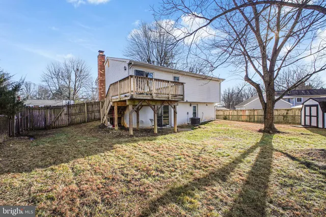 a view of wooden deck and trees