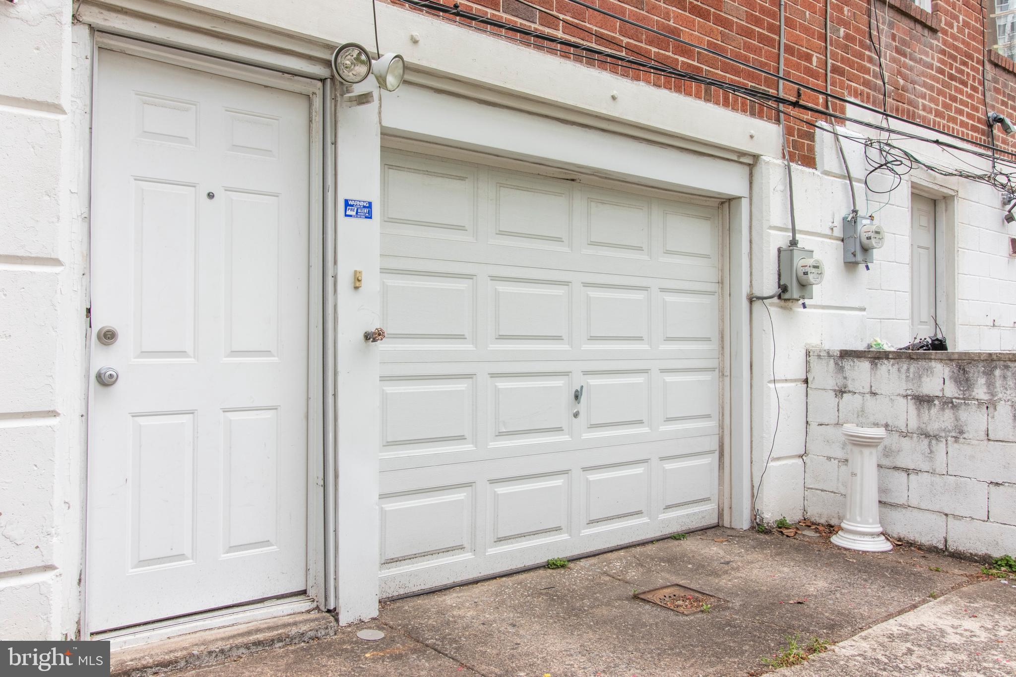 2745 East Country Club Road Philadelphia, PA 19131 - Photo 30 of 34 Back door and Garage