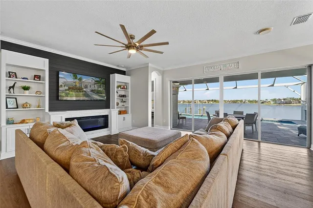 a spacious bathroom with a double vanity sink a mirror and a bathtub
